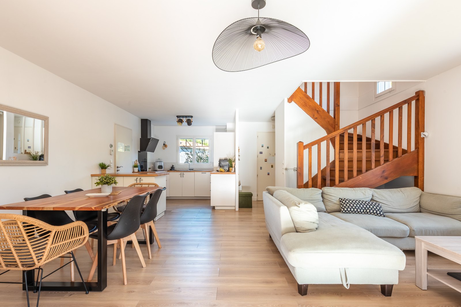 Bright living room open to the dining area